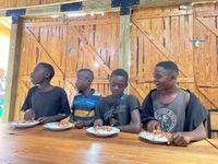 Street children who are in Iringa Municipal Council taking lunch food supported by WYCDO.